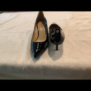Beautiful black kitten healed pumps